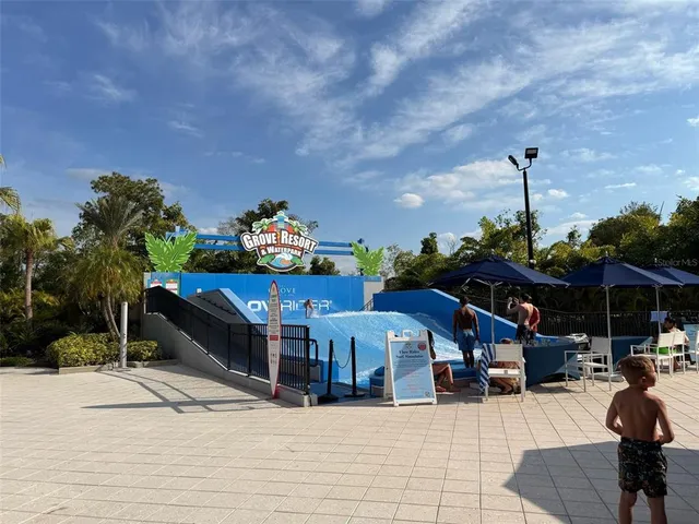 a room with wooden floor and furniture