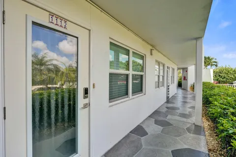 a view of a door and a window