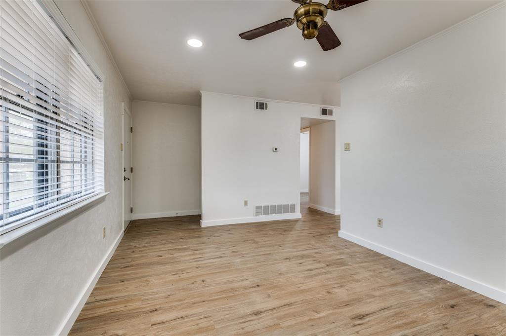 1230 Fairdale Street Irving, TX 75062 - Photo 4 of 24 Empty room with light wood-style flooring, recessed lighting, ornamental molding, and ceiling fan