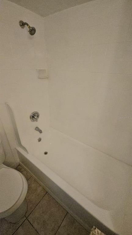 4208 8th St Court East Bradenton, FL 34208 - Photo 17 of 33 a bathroom with a toilet and a shower