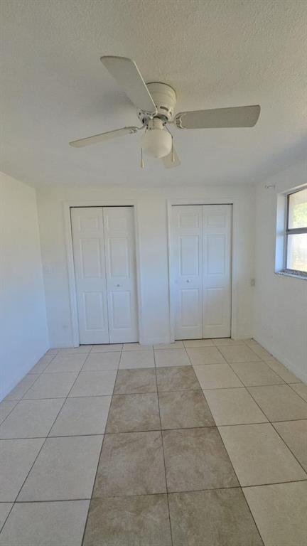 4208 8th St Court East Bradenton, FL 34208 - Photo 19 of 33 a view of an empty room with a window