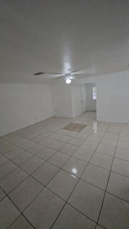 4208 8th St Court East Bradenton, FL 34208 - Photo 27 of 33 a view of a room with an empty space and wooden floor
