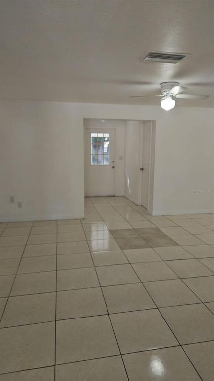 4208 8th St Court East Bradenton, FL 34208 - Photo 8 of 33 a view of an empty room with a window