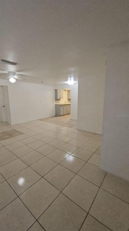 4208 8th St Court East Bradenton, FL 34208 - Photo 9 of 33 a view of a refrigerator and window in a room