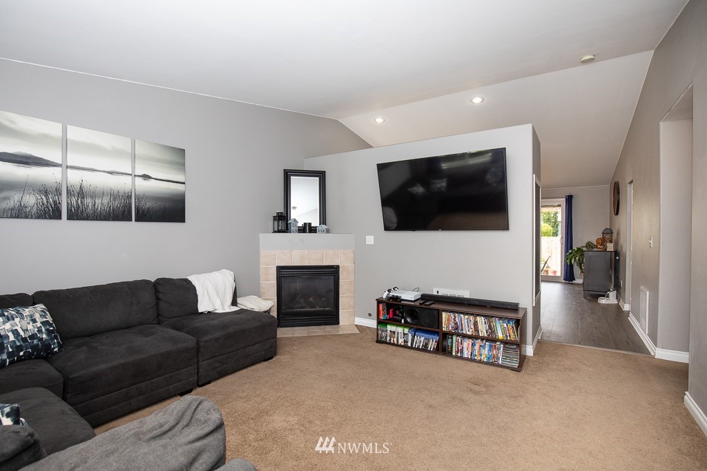 1119 Merea Lane Sultan, WA 98294 - Photo 2 of 20 a living room with furniture and a flat screen tv