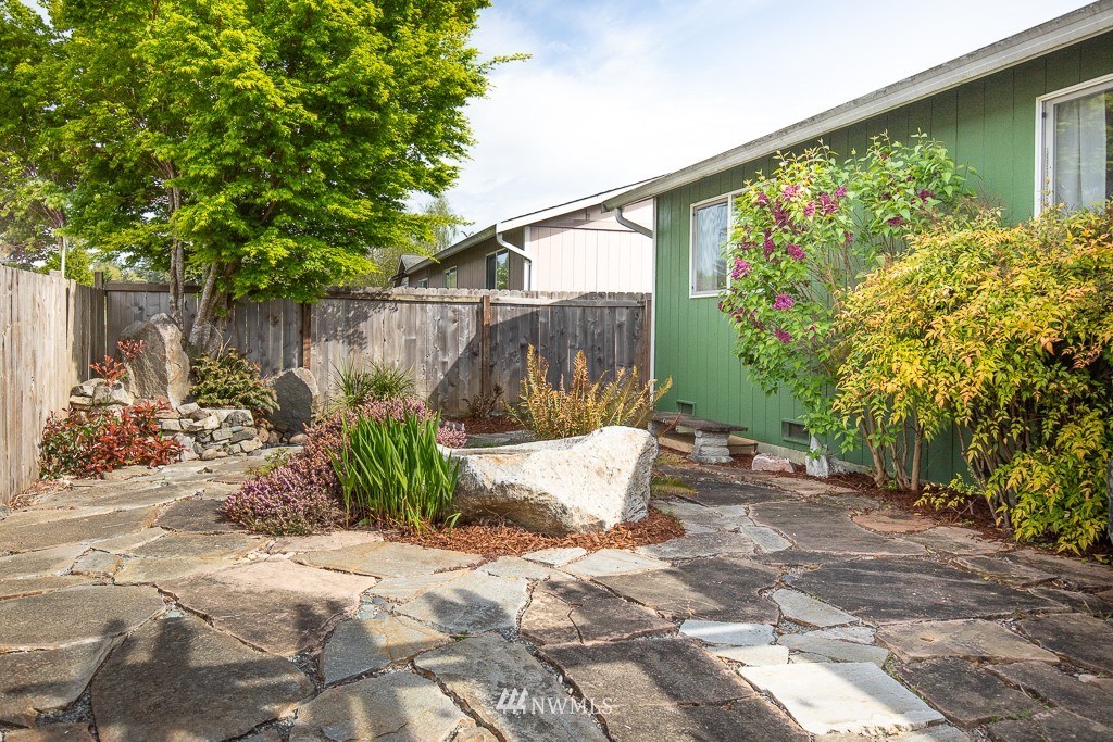 1119 Merea Lane Sultan, WA 98294 - Photo 15 of 20 a view of a backyard with plants and trees