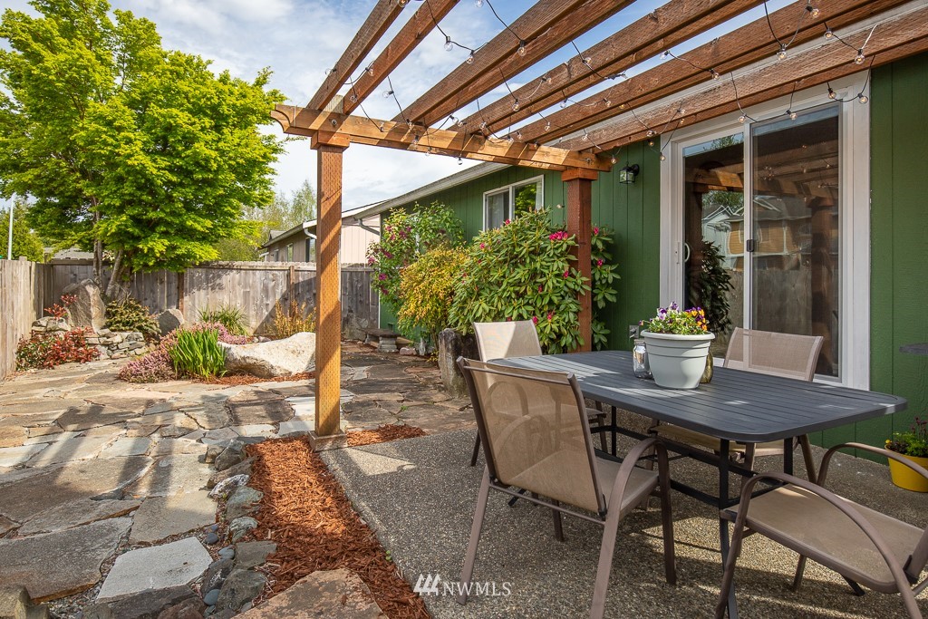 1119 Merea Lane Sultan, WA 98294 - Photo 16 of 20 a view of a table and chairs in patio of the house