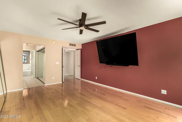 a view of a livingroom with a flat screen tv