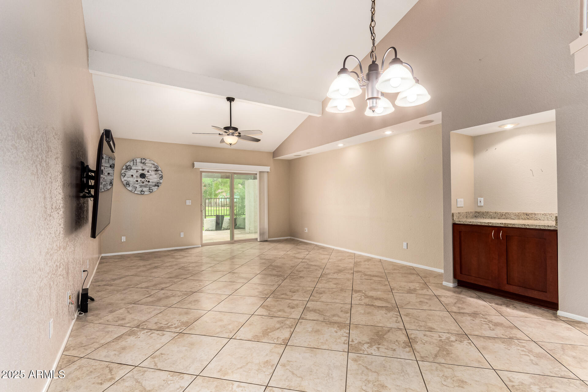 11615 North 40th Way Phoenix, AZ 85028 - Photo 6 of 34 a view of an empty room with a window