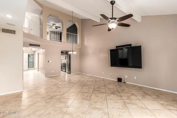 a view of a livingroom with a flat screen tv