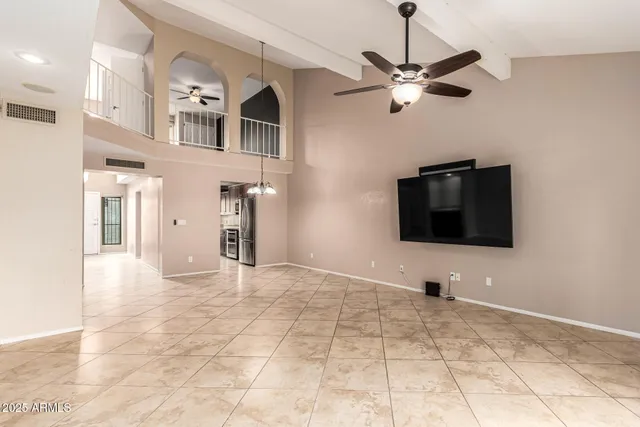 a view of a livingroom with a flat screen tv