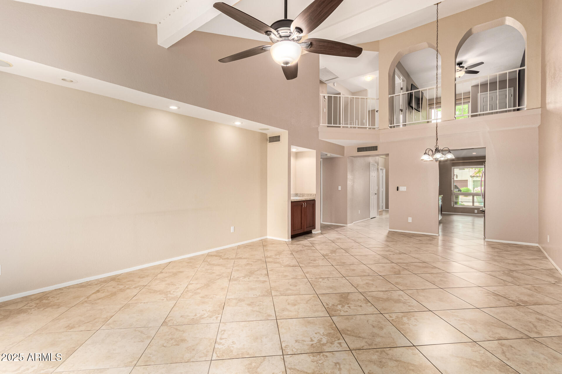 11615 North 40th Way Phoenix, AZ 85028 - Photo 8 of 34 a view of an empty room with a window