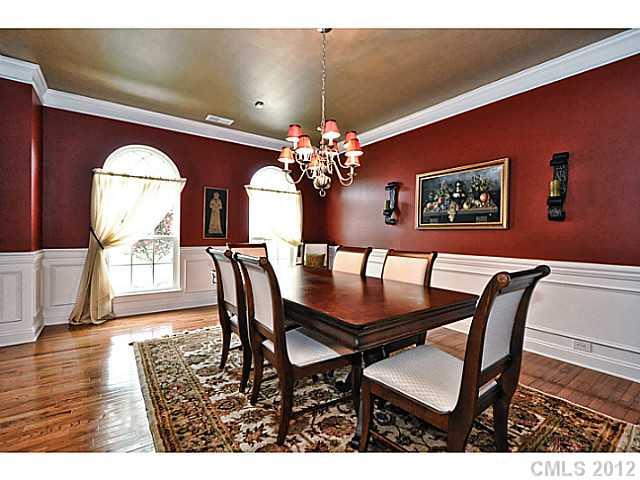265 Lorraine Road, Unit 15 Fort Mill, SC 29708 - Photo 2 of 16 a view of a dining room with furniture and chandelier