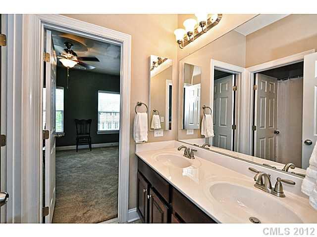 265 Lorraine Road, Unit 15 Fort Mill, SC 29708 - Photo 13 of 16 a en suite bathroom with a sink double vanity and a mirror