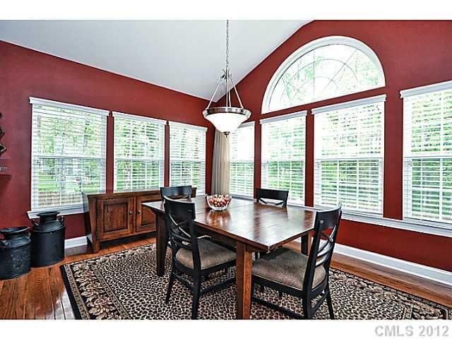 265 Lorraine Road, Unit 15 Fort Mill, SC 29708 - Photo 5 of 16 a dining room with furniture a rug and a large window