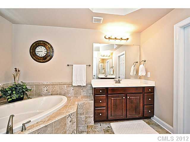 265 Lorraine Road, Unit 15 Fort Mill, SC 29708 - Photo 8 of 16 a bathroom with a sink and a mirror