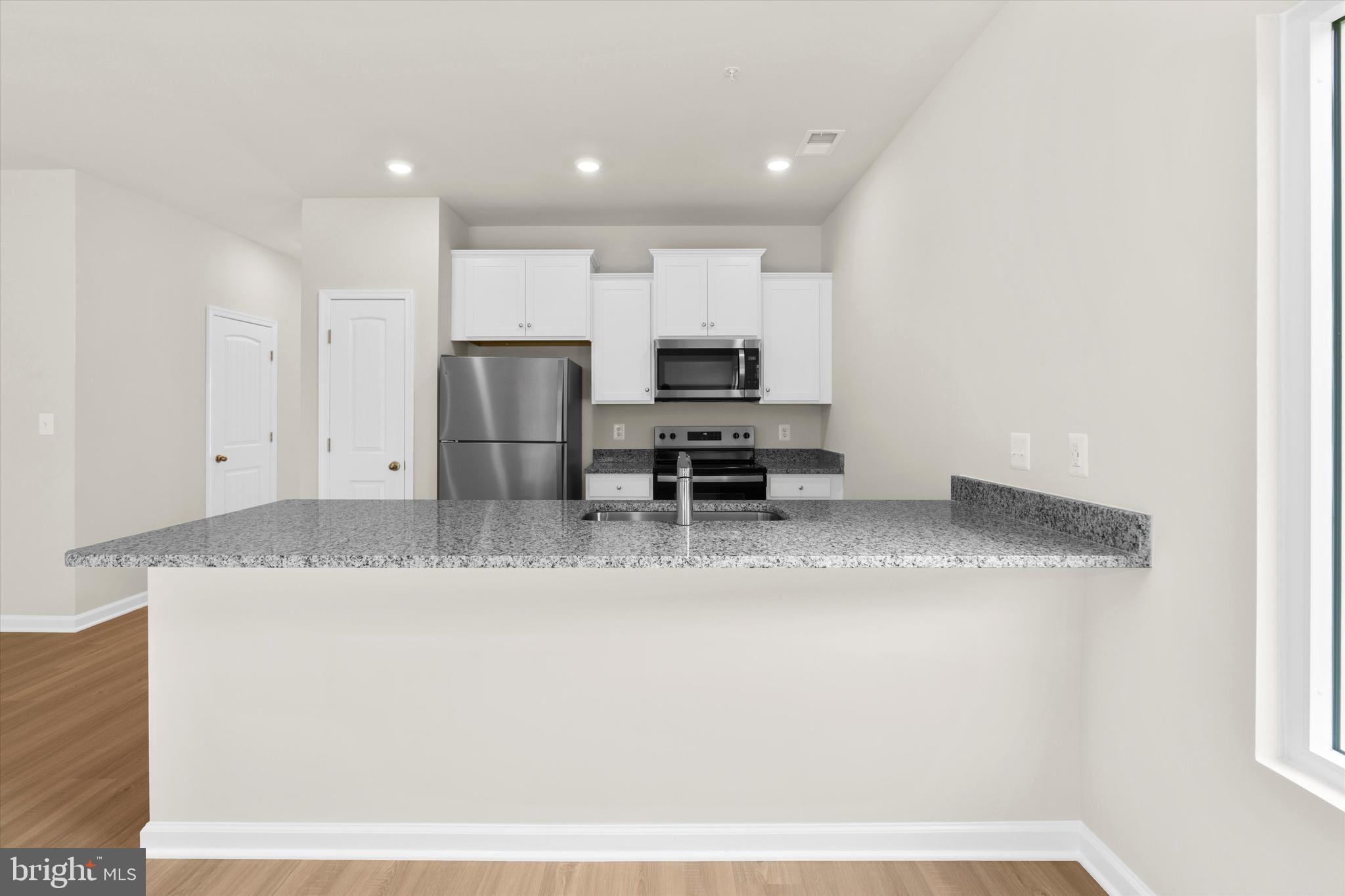 8120 Bartholomew Court Baltimore, MD 21206 - Photo 26 of 47 Kitchen
Island/Breakfast Bar