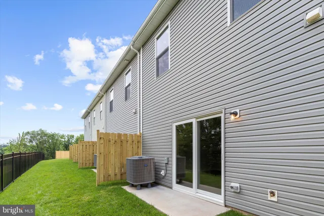 a backyard of a house with garden