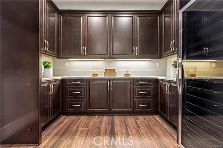 51 Dunmore Irvine, CA 92620 - Photo 12 of 23 a bathroom with a sink a mirror and cabinets