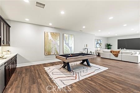 51 Dunmore Irvine, CA 92620 - Photo 14 of 23 a living room with furniture a flat screen tv and a wooden floor