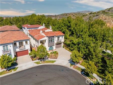 51 Dunmore Irvine, CA 92620 - Photo 21 of 23 an aerial view of a house with a yard and lake view