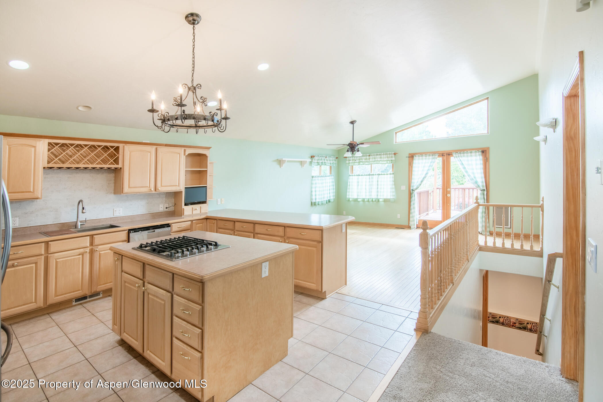 1230 Fir Avenue Rifle, CO 81650 - Photo 11 of 34 a kitchen that has a lot of cabinets in it