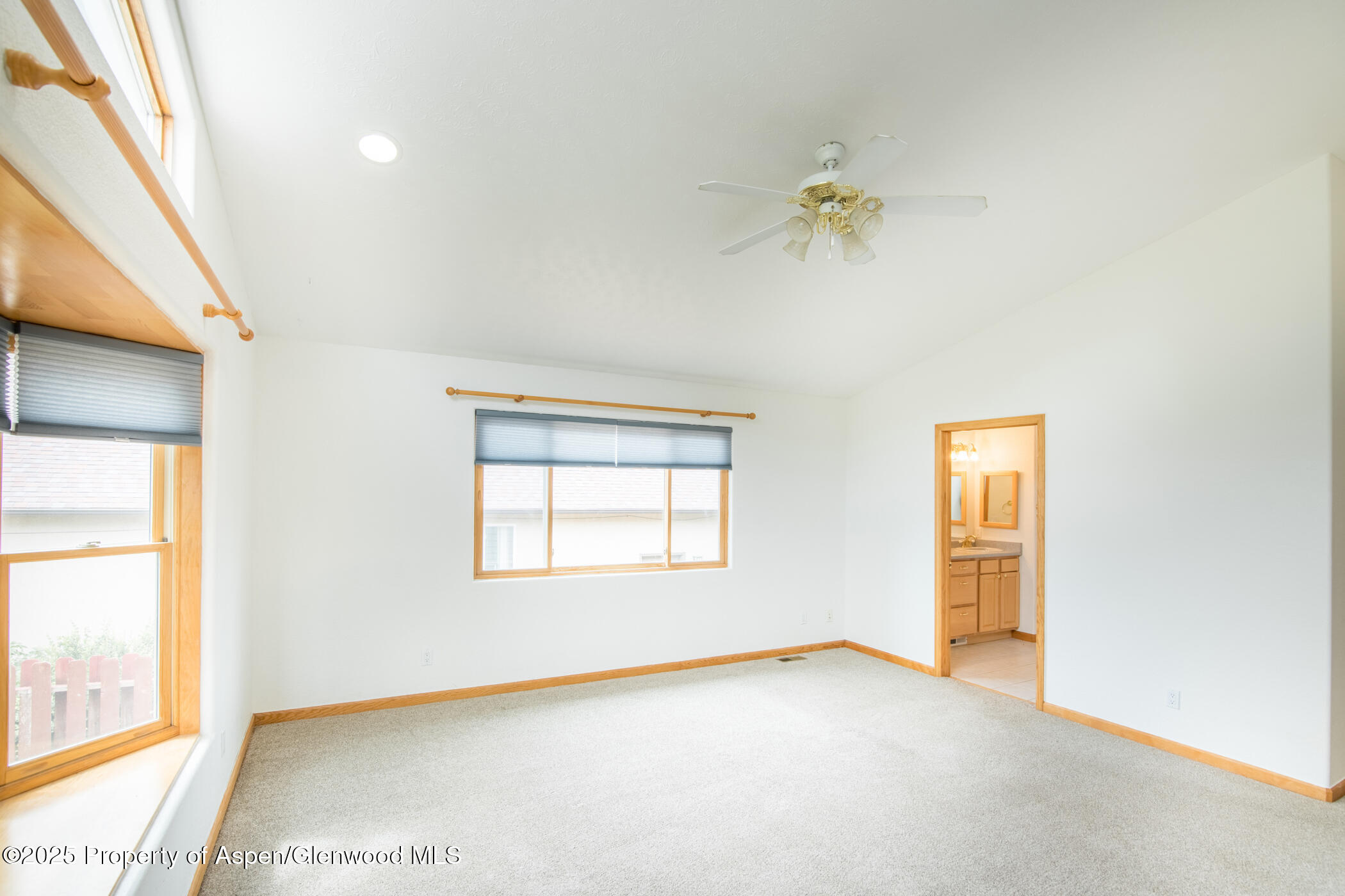 1230 Fir Avenue Rifle, CO 81650 - Photo 15 of 34 an empty room with windows and closet