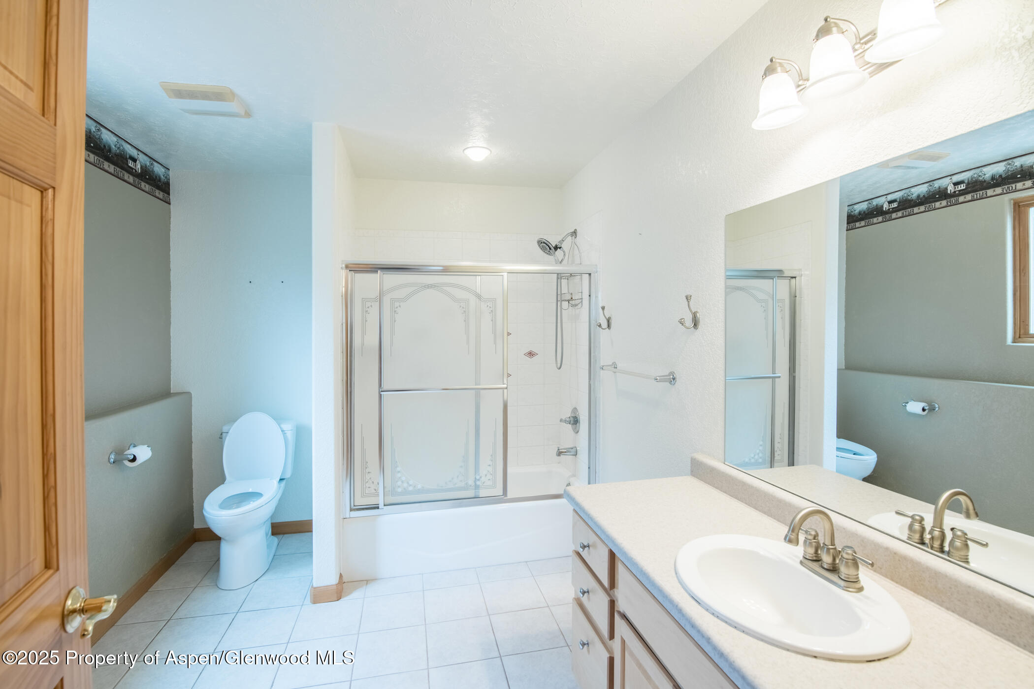 1230 Fir Avenue Rifle, CO 81650 - Photo 22 of 34 a bathroom with a sink toilet and shower