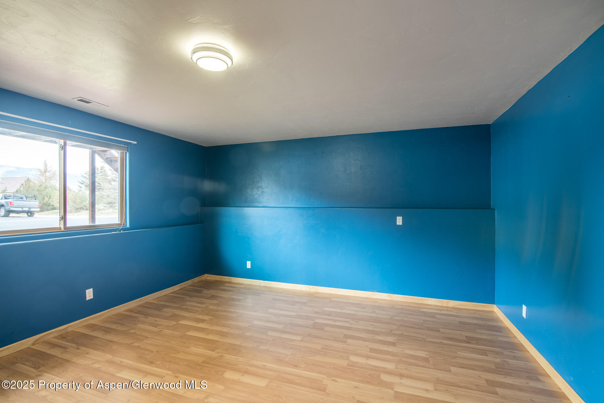 1230 Fir Avenue Rifle, CO 81650 - Photo 25 of 34 a view of an empty room with a window