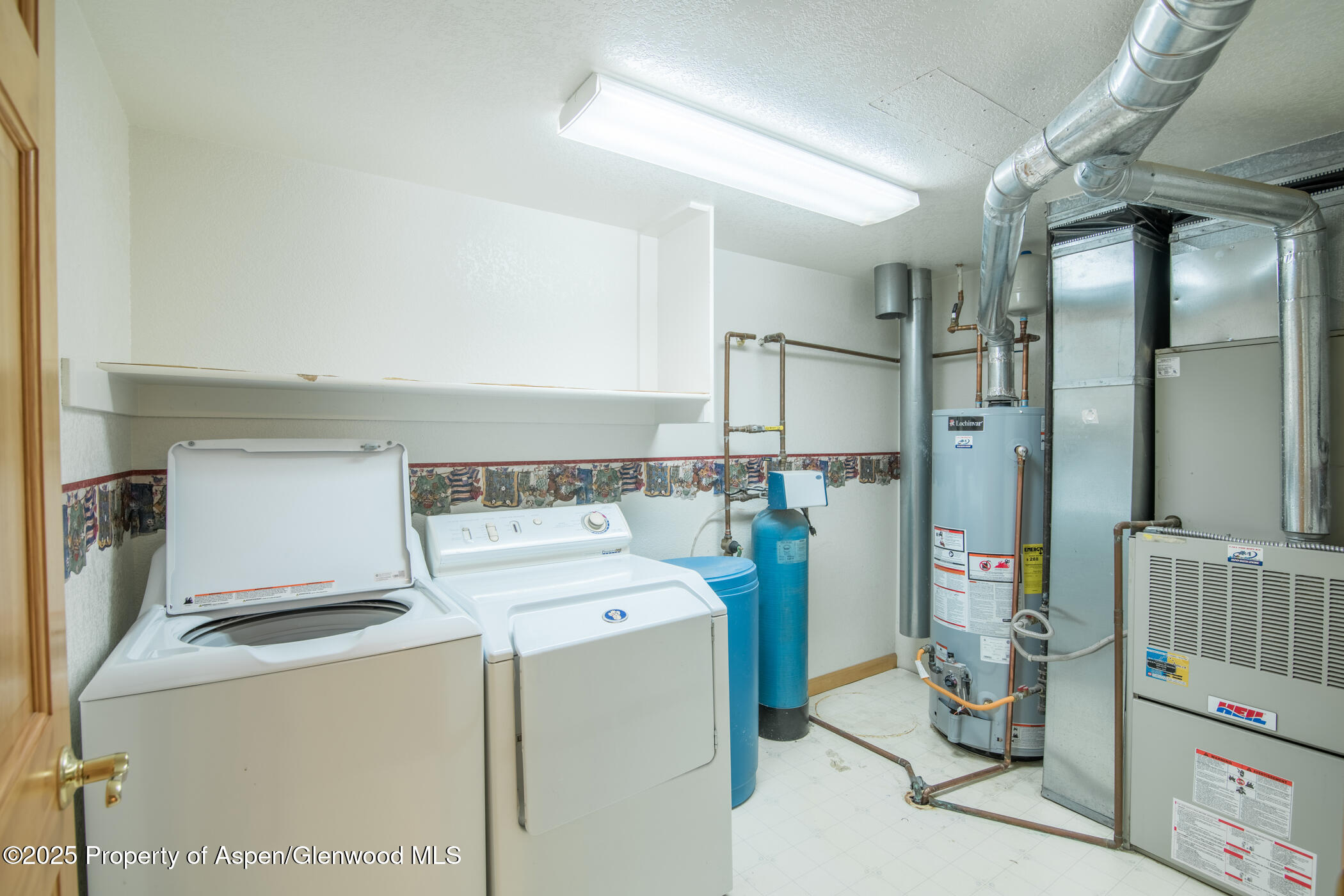1230 Fir Avenue Rifle, CO 81650 - Photo 29 of 34 a utility room with dryer and washer