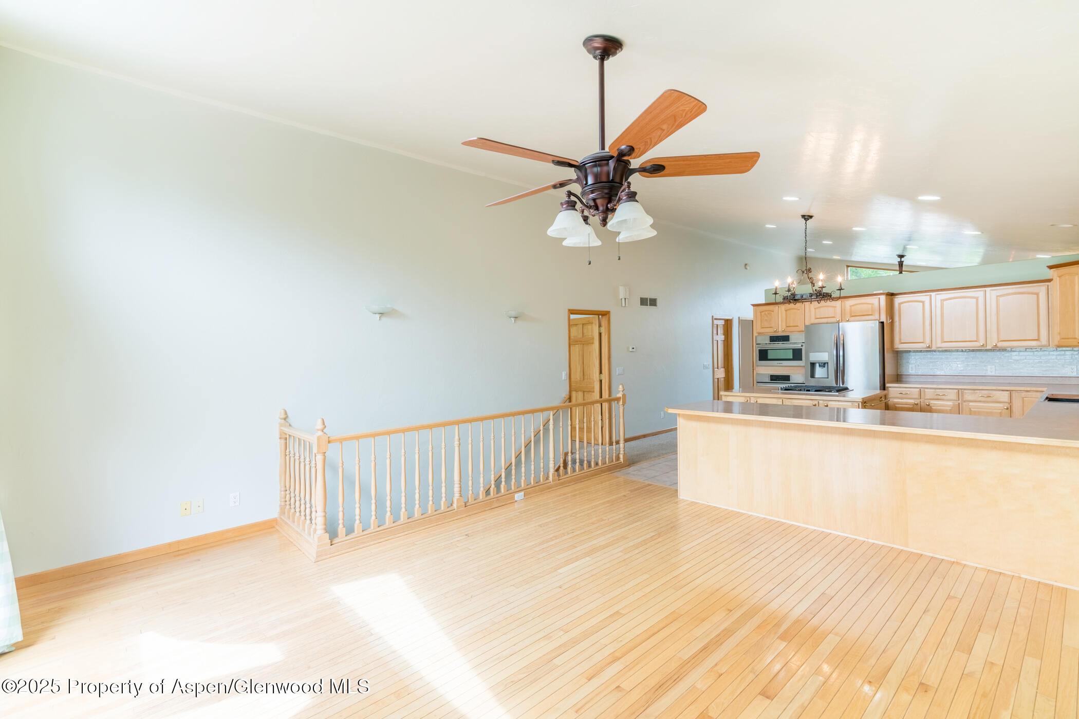 1230 Fir Avenue Rifle, CO 81650 - Photo 10 of 34 a view of a living room and kitchen