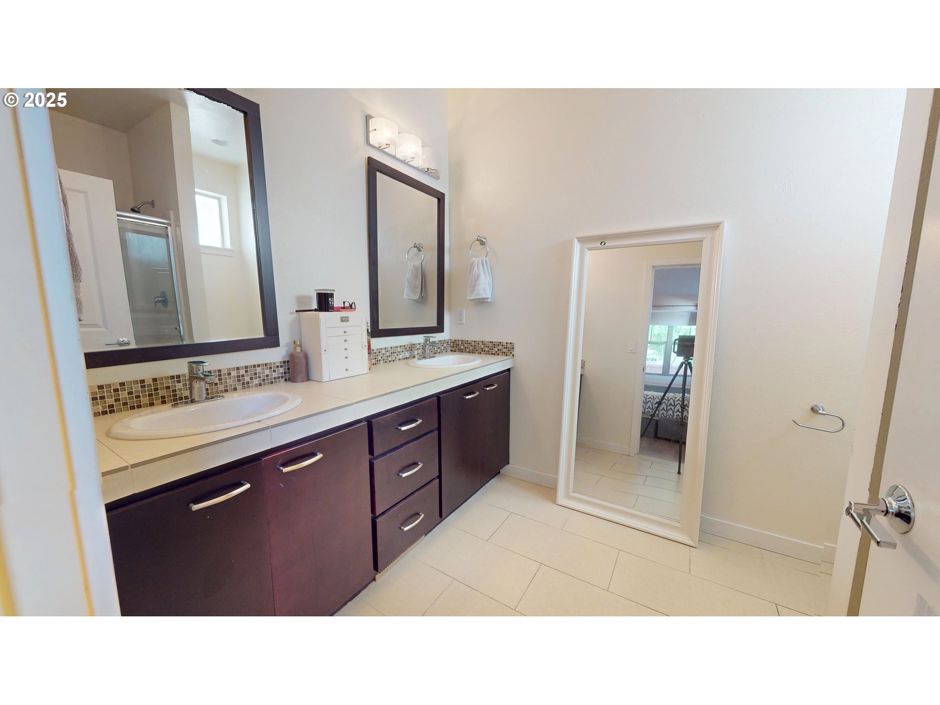 375 Mia Lane Eugene, OR 97401 - Photo 24 of 44 a bathroom with a sink double vanity and a mirror