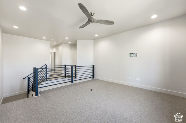 1067 Station Loop Road Park City, UT 84098 - Photo 18 of 38 Recessed lighting, ceiling fan, carpeted flooring, and a contemporary metal railing system