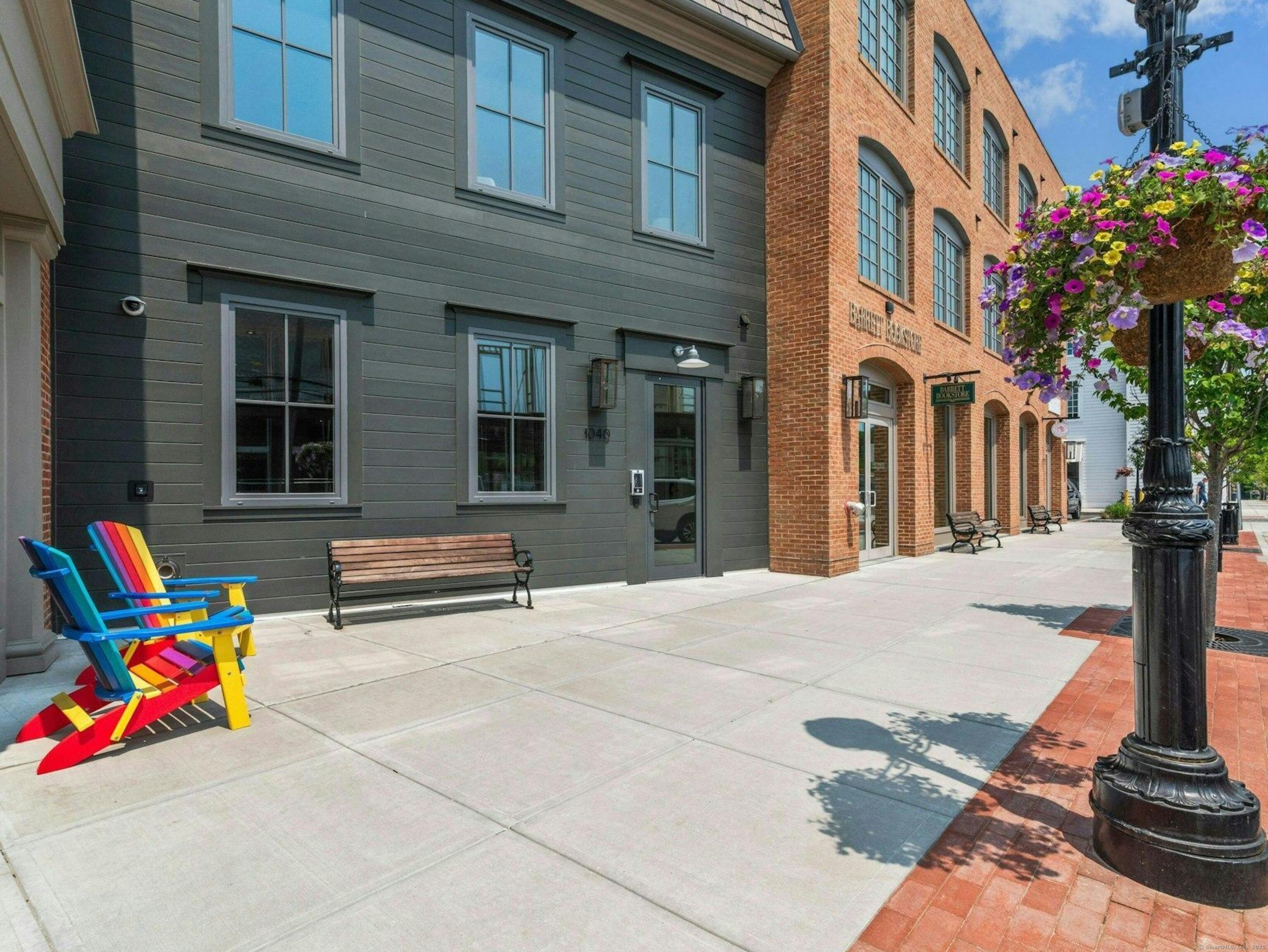 a view of a brick building with many windows