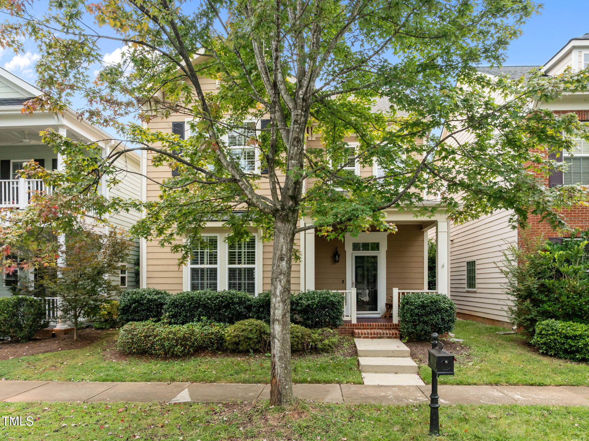 831 Historian Street Raleigh, NC 27603 - Photo 2 of 52 a front view of a house with yard and green space