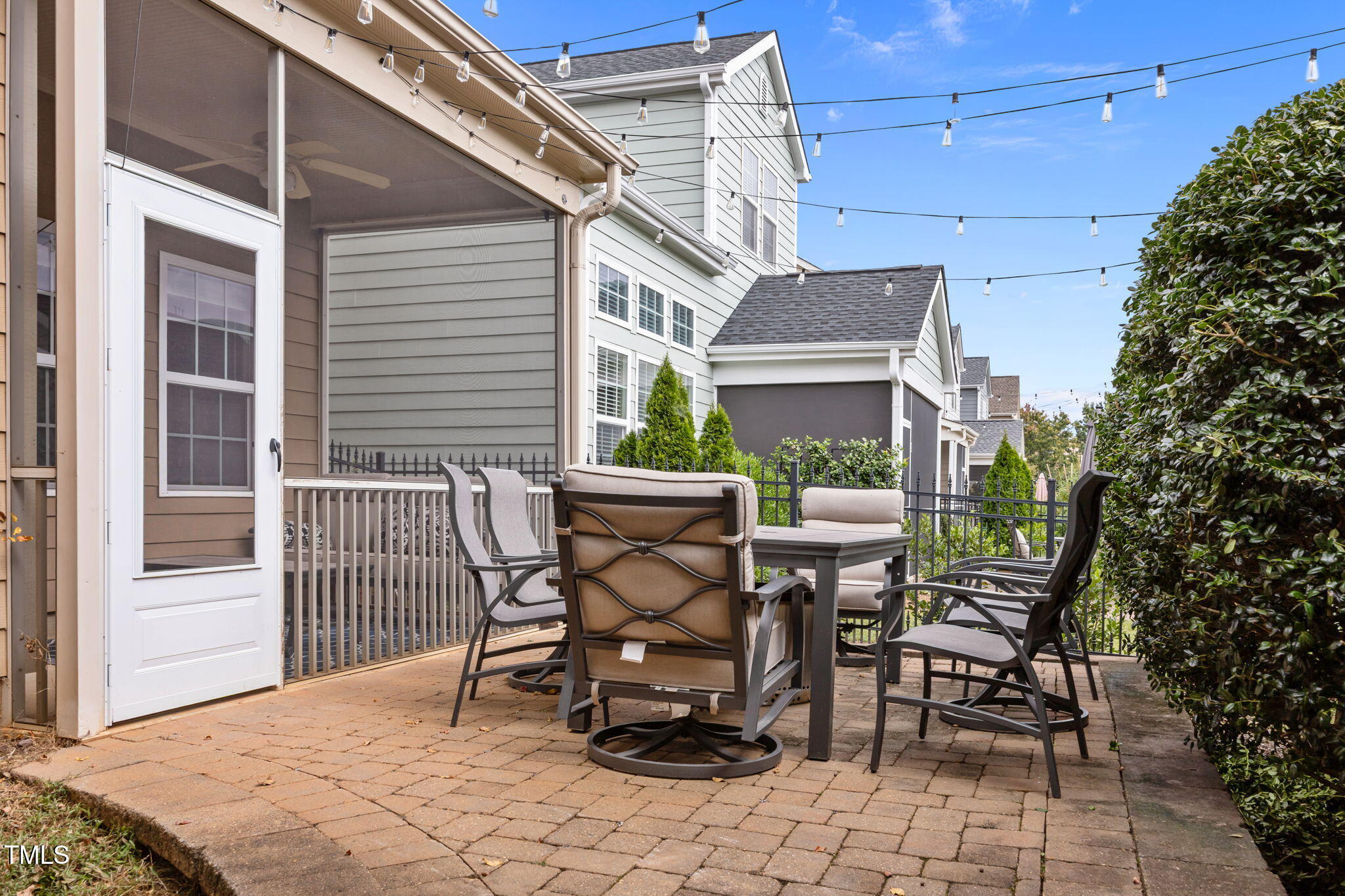 831 Historian Street Raleigh, NC 27603 - Photo 40 of 52 a view of a patio with table and chairs and potted plants