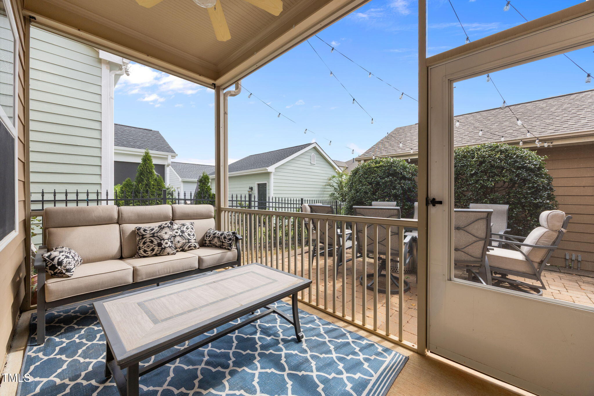 831 Historian Street Raleigh, NC 27603 - Photo 10 of 52 a balcony with furniture and wooden deck