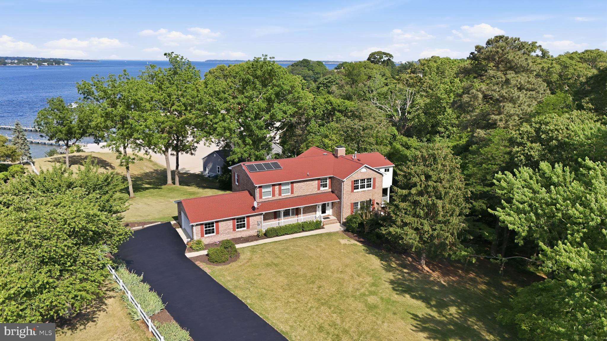 23500 River Road Lexington Park, MD 20653 - Photo 85 of 92 an aerial view of a house with a yard basket ball court and outdoor seating