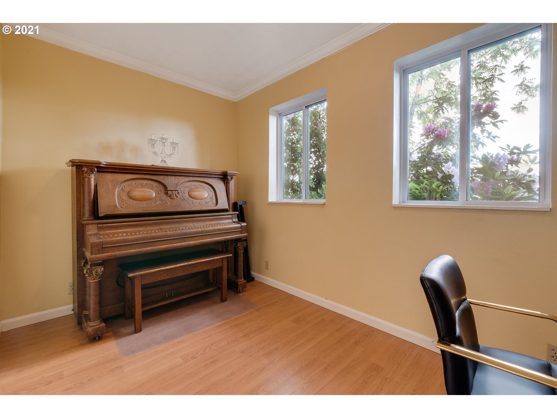 2559 Southwest Dilley Road Forest Grove, OR 97116 - Photo 16 of 32 a view of a workspace with furniture and a window