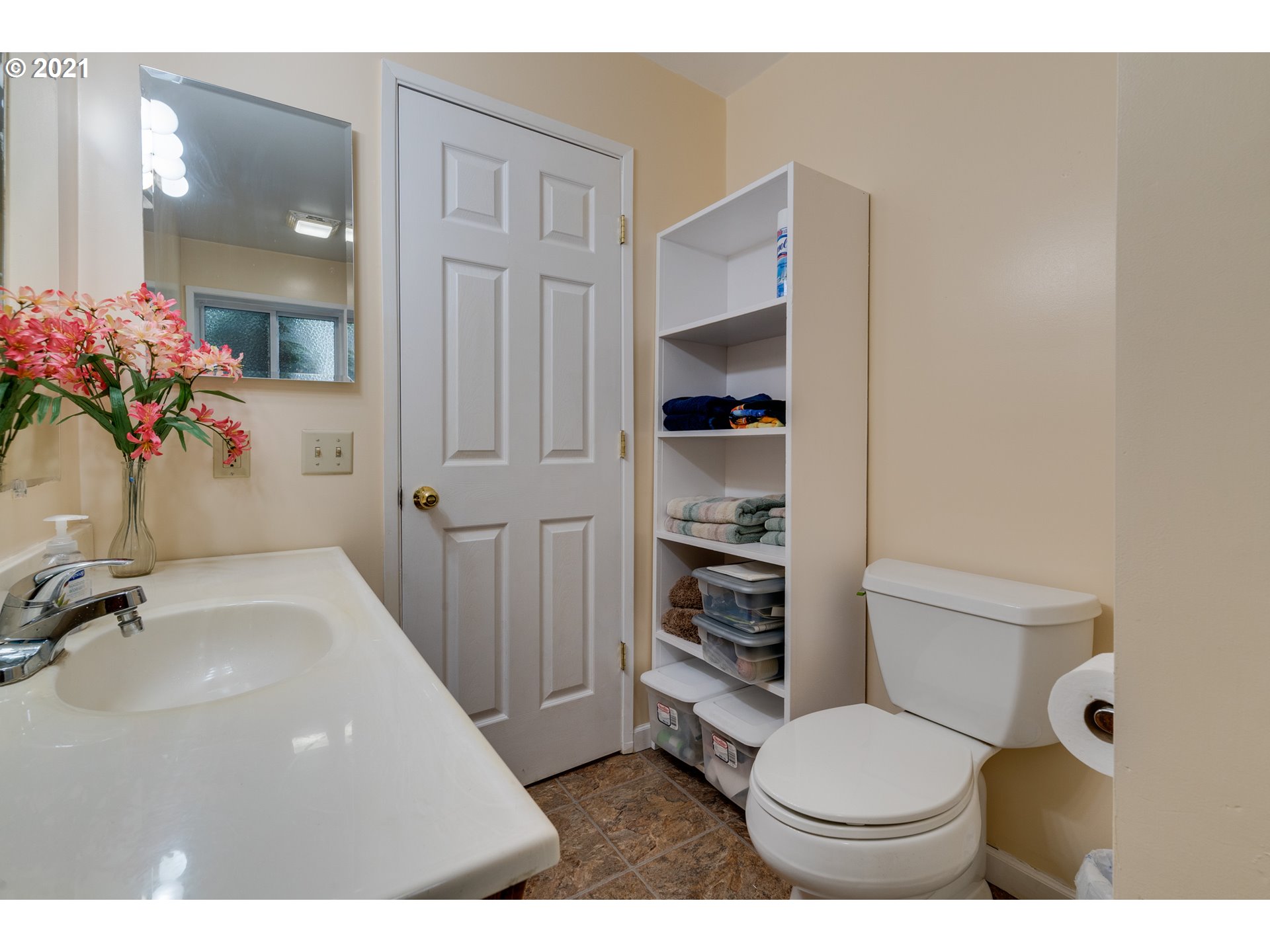 2559 Southwest Dilley Road Forest Grove, OR 97116 - Photo 19 of 32 a bathroom with a sink toilet and shower