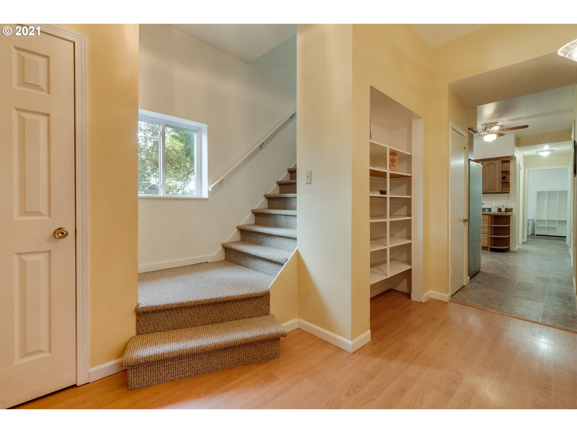 2559 Southwest Dilley Road Forest Grove, OR 97116 - Photo 21 of 32 a view of entryway with wooden floor and stairs