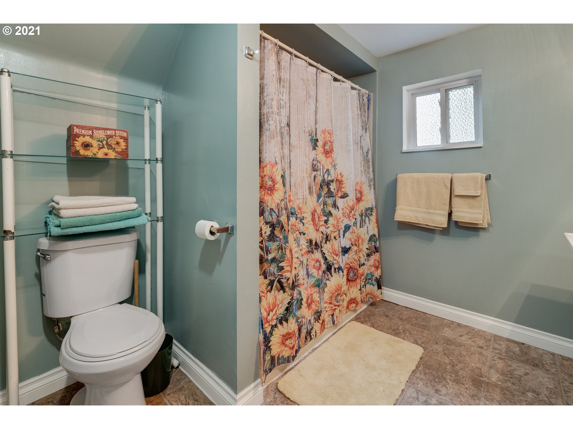 2559 Southwest Dilley Road Forest Grove, OR 97116 - Photo 25 of 32 a bathroom with a toilet and a shower