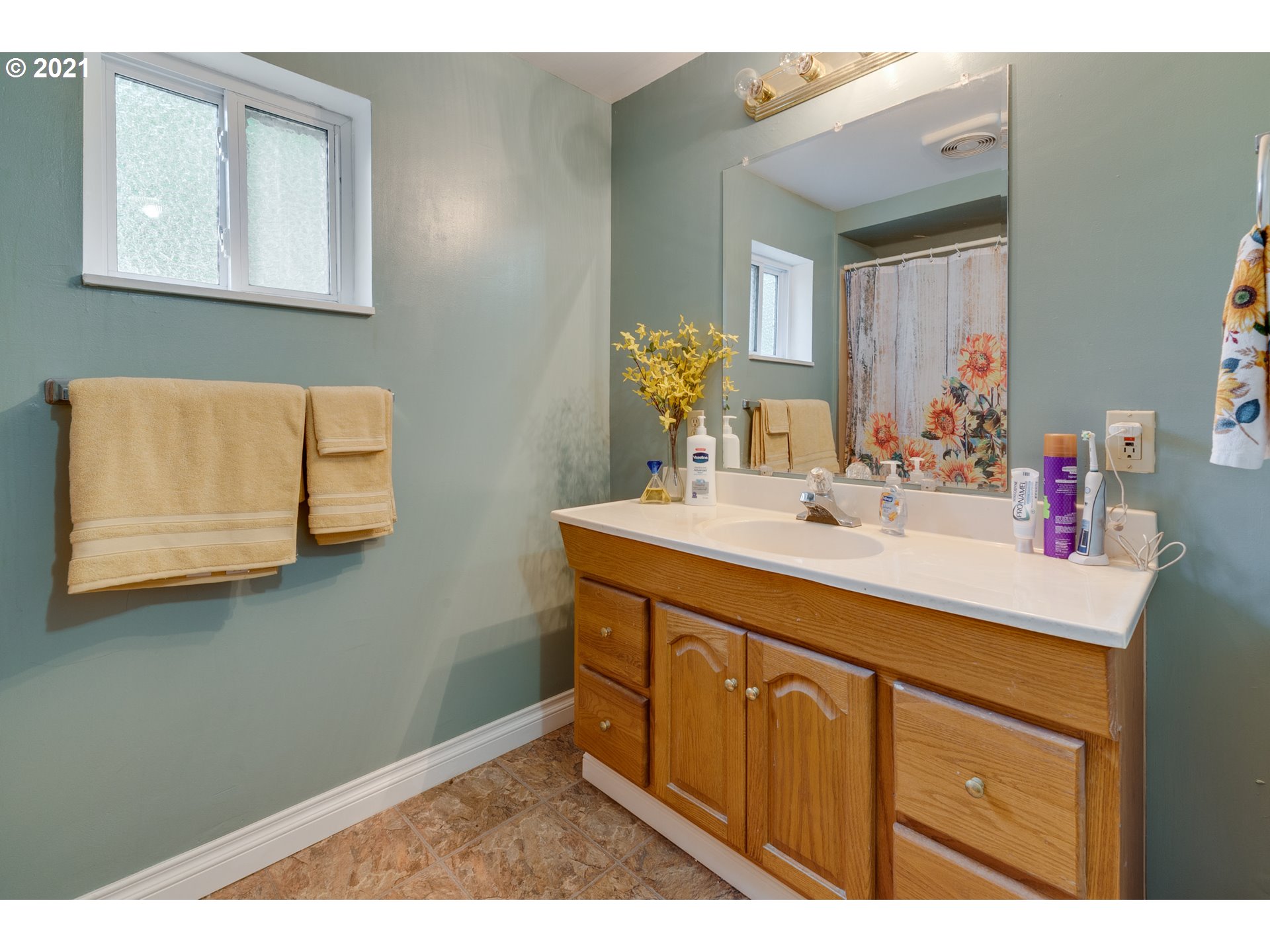 2559 Southwest Dilley Road Forest Grove, OR 97116 - Photo 26 of 32 a bathroom with a sink vanity and mirror