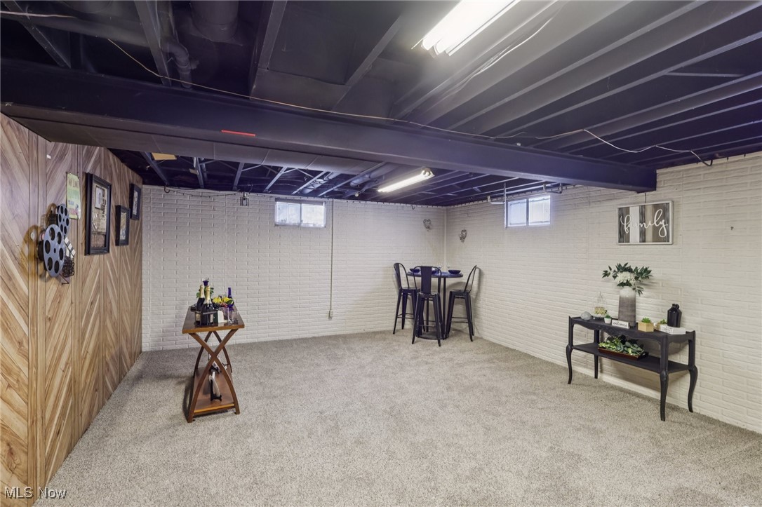 751 Bacon Road Painesville, OH 44077 - Photo 36 of 50 Basement featuring carpet flooring and healthy amount of natural light