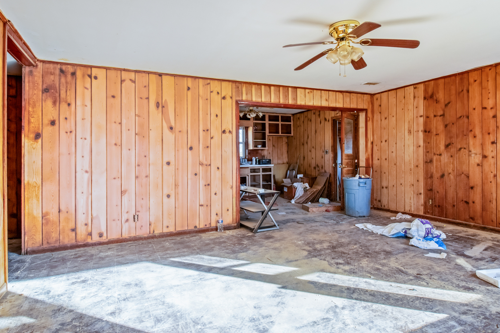 5827 East 3500S Road St. Anne, IL 60964 - Photo 2 of 16 a view of a room with gym equipment and a window