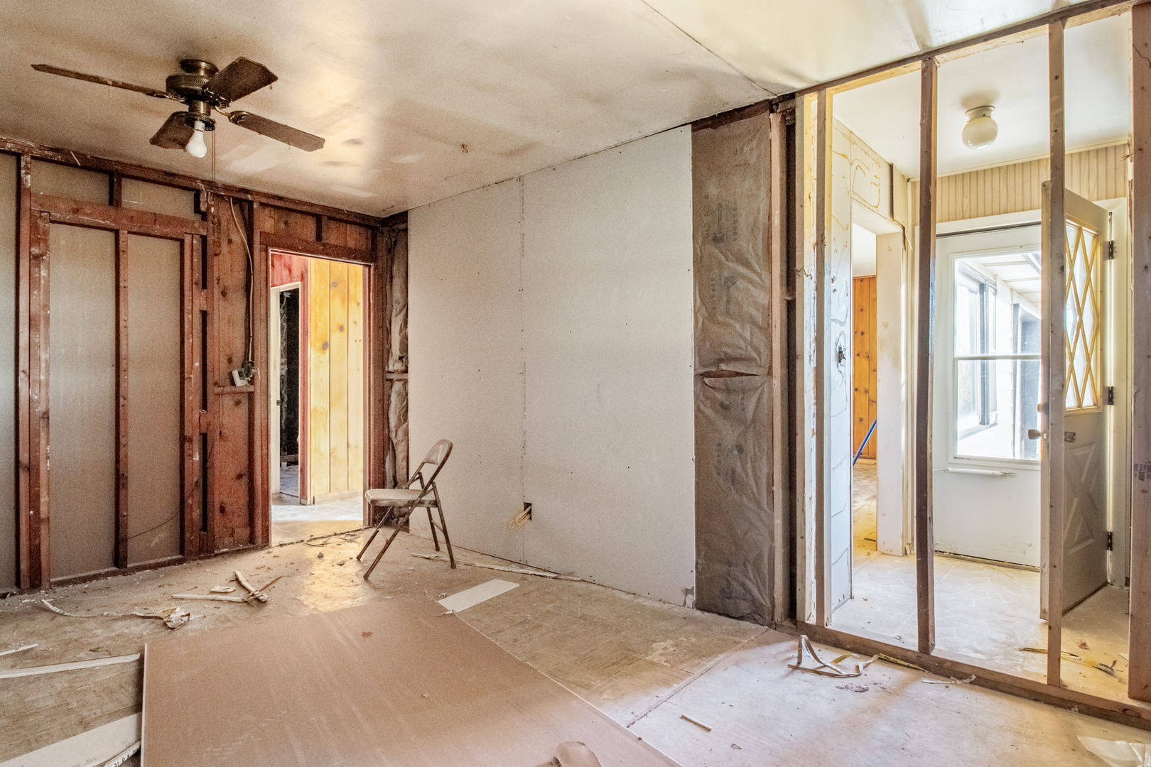 5827 East 3500S Road St. Anne, IL 60964 - Photo 5 of 16 a view of a room with a windows and ceiling fan