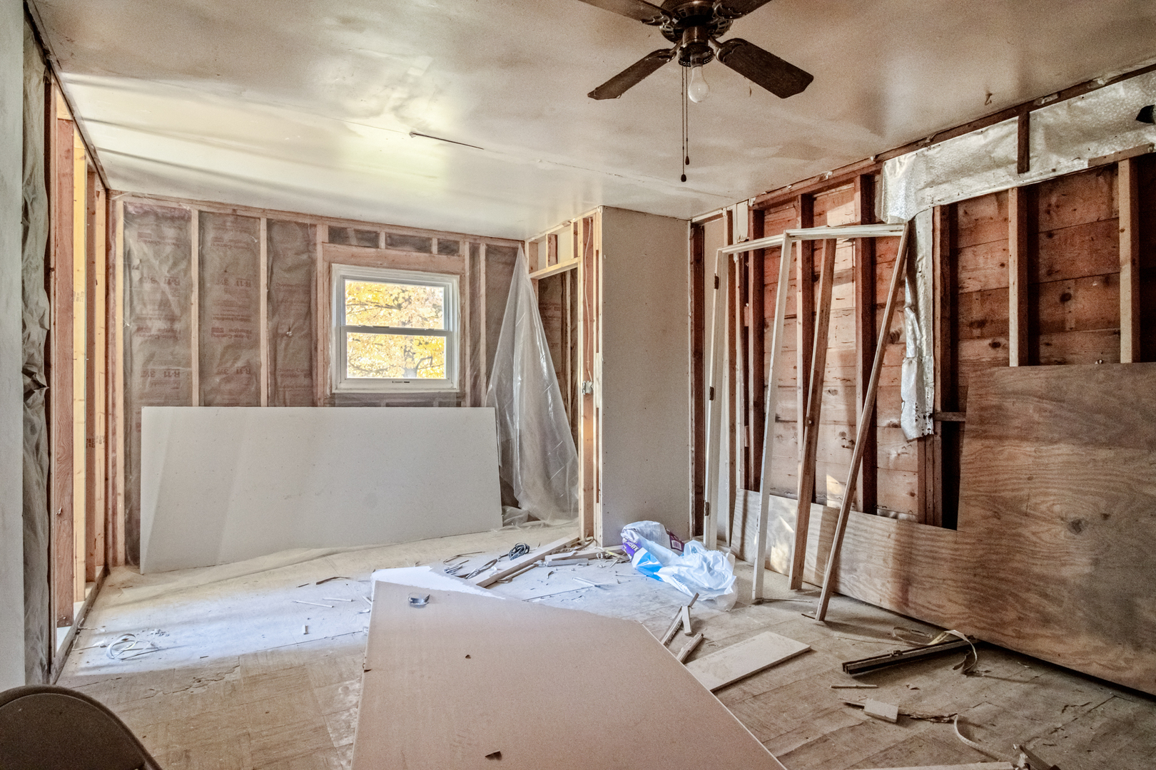 5827 East 3500S Road St. Anne, IL 60964 - Photo 6 of 16 a bedroom with a bed dresser and a window