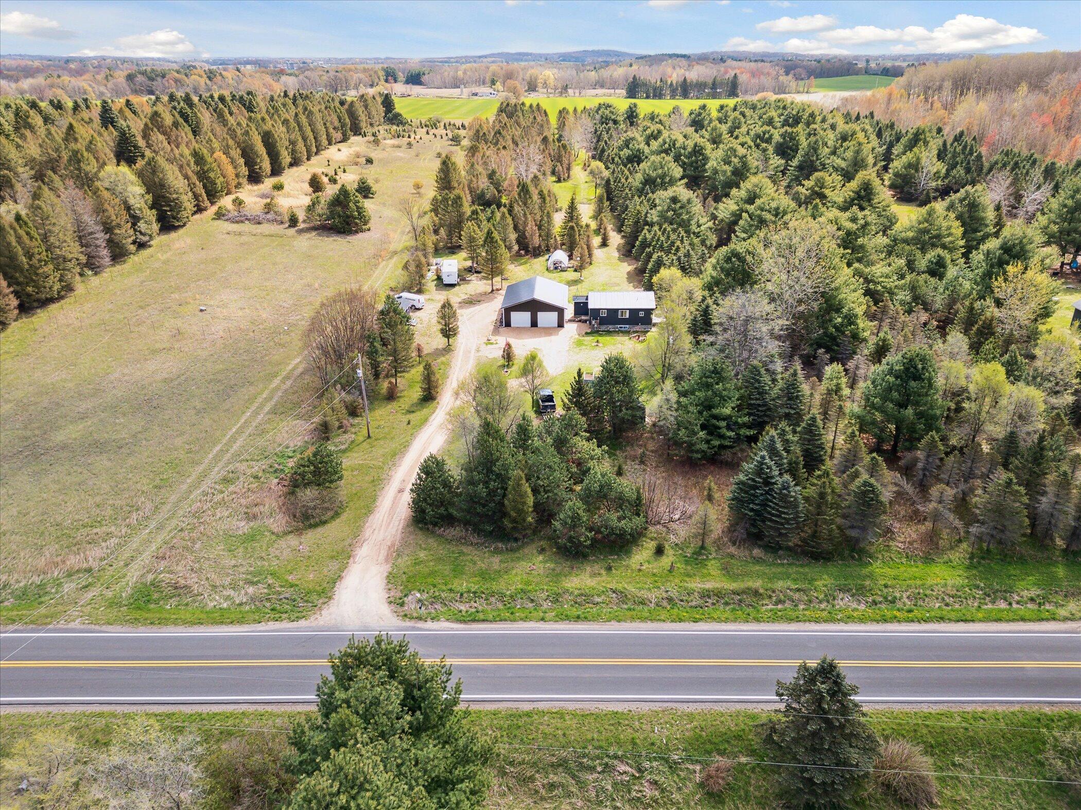 1366 Grow Road Northwest Stanton, MI 48888 - Photo 32 of 48 51-1366-Grow-Rd-NW-Stanton-MI-48888-Wind