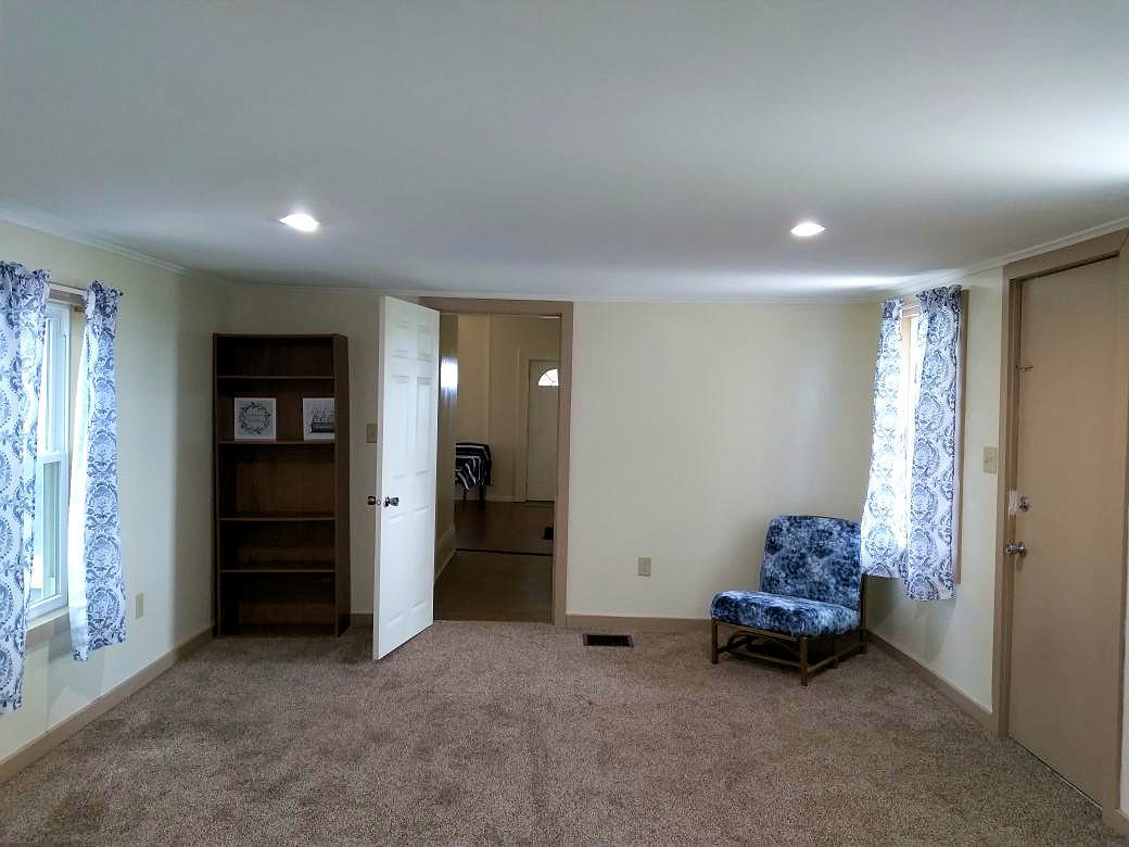 5122 North Bennett Road Monroe Center, IL 61052 - Photo 11 of 29 a view of hallway with livingroom and furniture