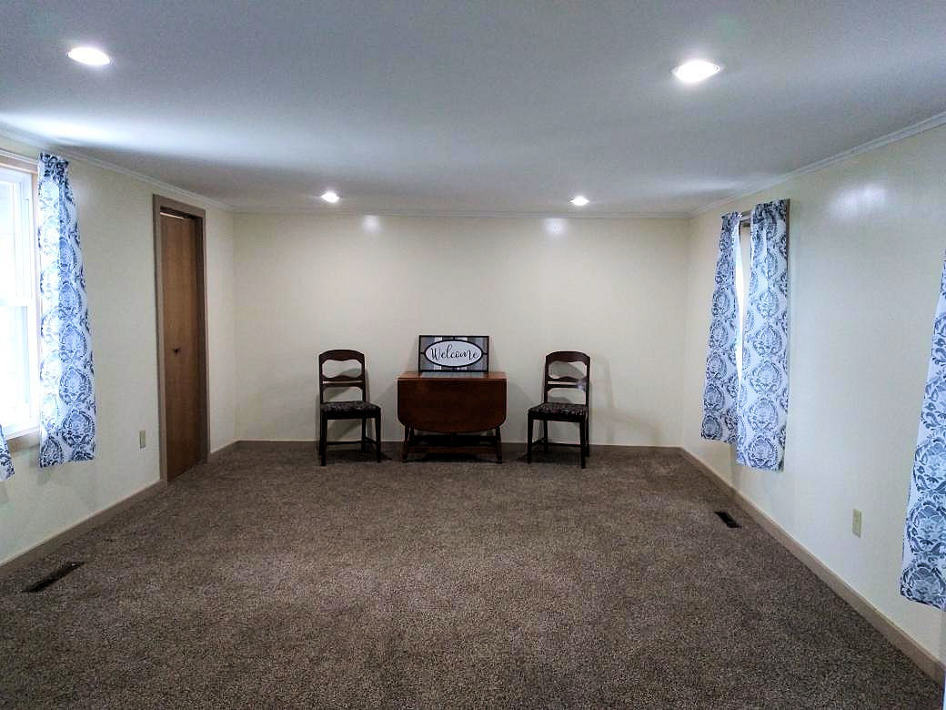 5122 North Bennett Road Monroe Center, IL 61052 - Photo 12 of 29 a view of a big room with windows and closet